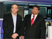 Schahram Dustdar (left), head of the Distributed Systems Group, with Dilip Rahulan, Chairman and CEO of Pacific Controls.